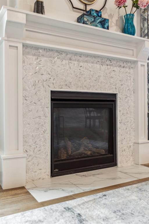 16309 Rangeland Dr, Oklahoma City, OK 73170 - detailed view of a fireplace and wood finished floors