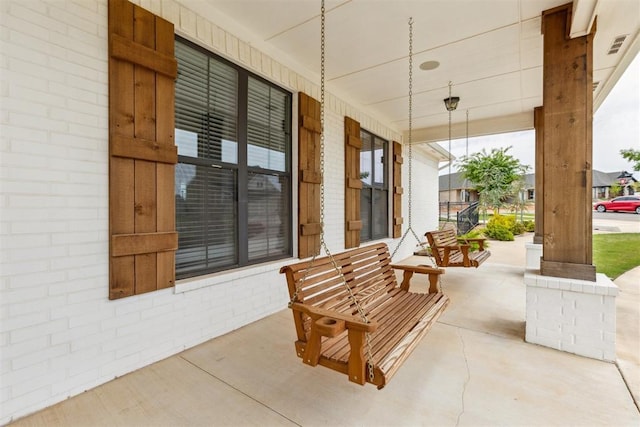16309 Rangeland Dr, Oklahoma City, OK 73170 - view of patio featuring a porch