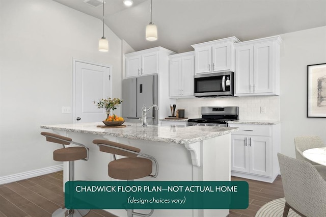 kitchen featuring stainless steel appliances, wood tiled floors, decorative backsplash, lofted ceiling, and white cabinetry