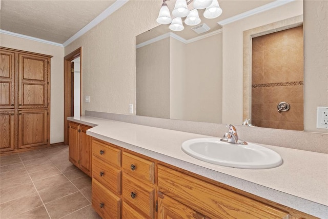 2001 Saber Ln, Weatherford, OK 73096 - full bath featuring a chandelier, vanity, crown molding, and tile patterned floors