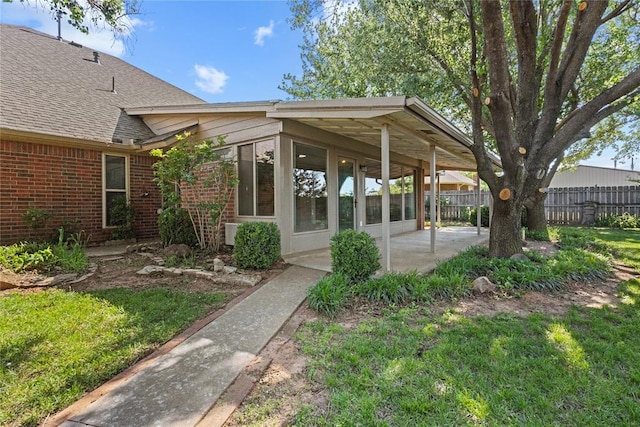 2001 Saber Ln, Weatherford, OK 73096 - view of yard with a patio and a sunroom