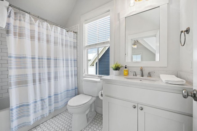 43 Center Ln, Carlton Landing, OK 74432 - bathroom with toilet, lofted ceiling, vanity, ceiling fan, and shower / tub combo