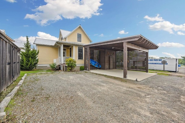 43 Center Ln, Carlton Landing, OK 74432 - rear view of house with metal roof
