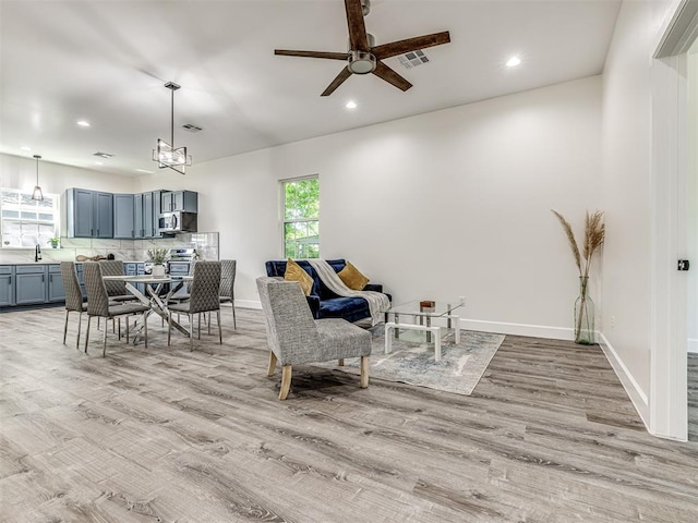 1800 NW 41st St, Oklahoma City, OK 73118 - living room with recessed lighting, light wood finished floors, ceiling fan, and baseboards