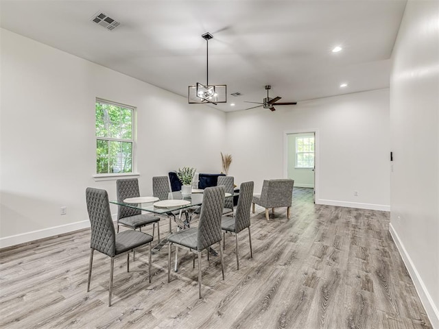 1800 NW 41st St, Oklahoma City, OK 73118 - dining area featuring wood finished floors, recessed lighting, baseboards, a chandelier, and ceiling fan
