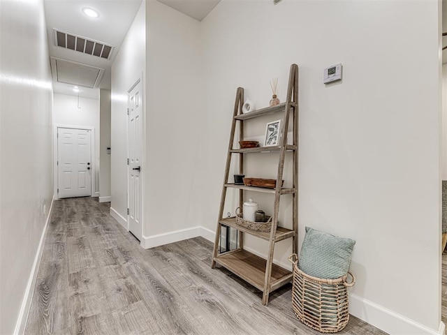 1800 NW 41st St, Oklahoma City, OK 73118 - hallway with attic access, wood finished floors, and baseboards