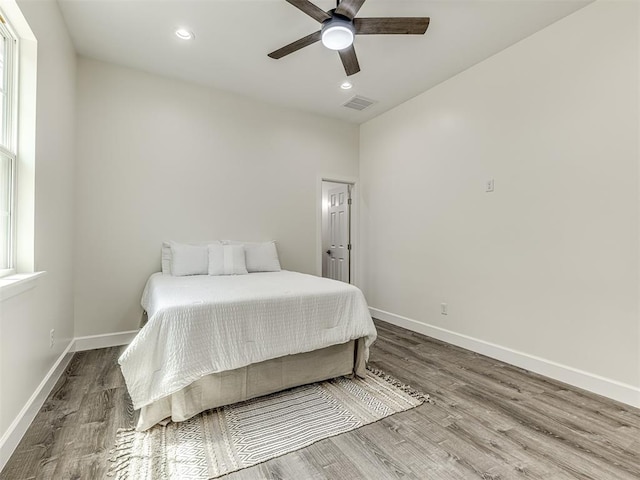 1800 NW 41st St, Oklahoma City, OK 73118 - bedroom featuring wood finished floors, baseboards, recessed lighting, and ceiling fan