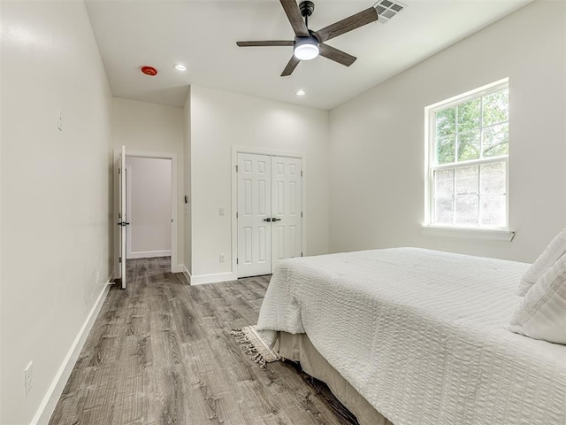 1800 NW 41st St, Oklahoma City, OK 73118 - bedroom featuring wood finished floors, baseboards, a closet, recessed lighting, and a ceiling fan