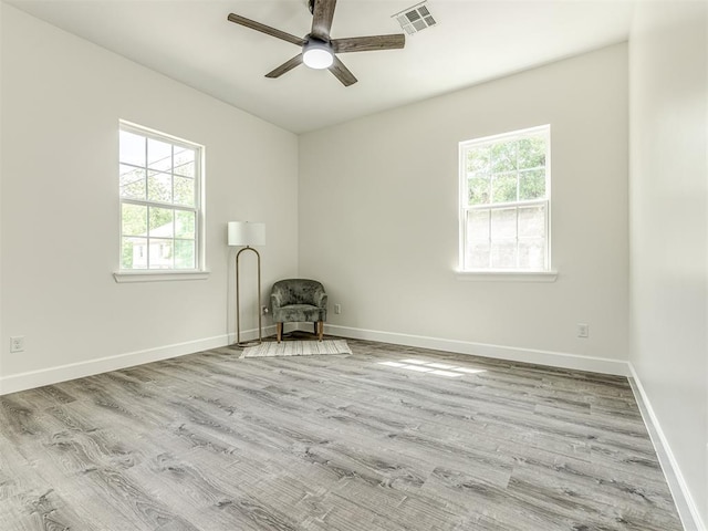 1800 NW 41st St, Oklahoma City, OK 73118 - unfurnished room with a ceiling fan, wood finished floors, and baseboards
