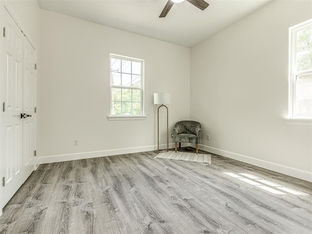 1800 NW 41st St, Oklahoma City, OK 73118 - unfurnished room with wood finished floors, plenty of natural light, baseboards, and a ceiling fan