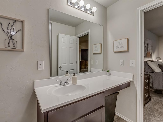 424 SE 5th Ter, Newcastle, OK 73065 - bathroom featuring vanity and ensuite bath