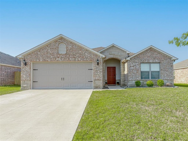 424 SE 5th Ter, Newcastle, OK 73065 - view of front of home with brick siding, concrete driveway, and a front lawn
