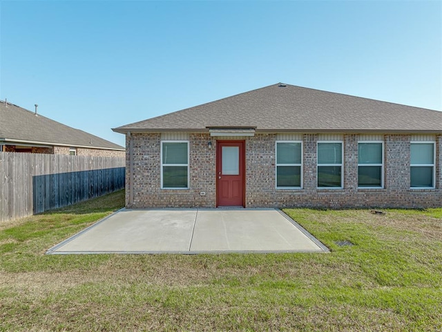 424 SE 5th Ter, Newcastle, OK 73065 - back of house featuring a patio area, brick siding, and roof with shingles