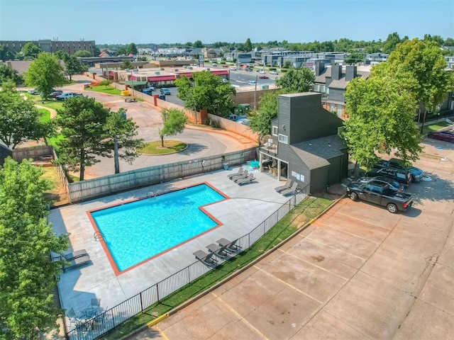 11530 N May Ave Unit D303, Oklahoma City, OK 73120 - view of swimming pool with a patio area