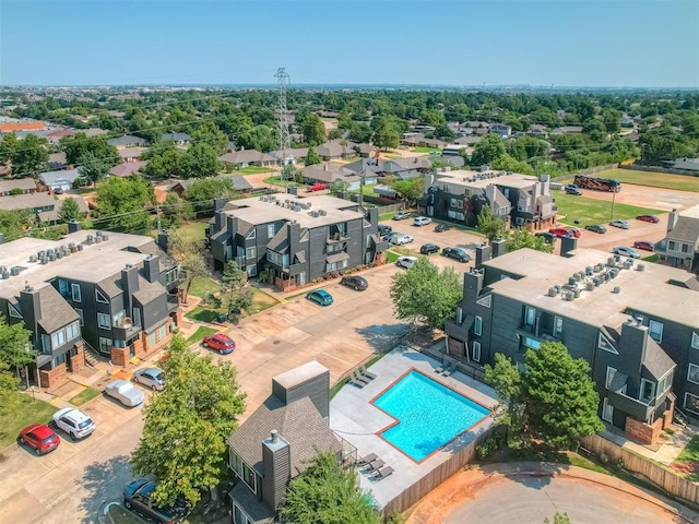 11530 N May Ave Unit D303, Oklahoma City, OK 73120 - aerial perspective of suburban area featuring a pool
