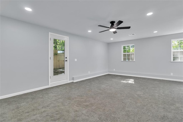 unfurnished room featuring recessed lighting, dark colored carpet, a ceiling fan, and baseboards