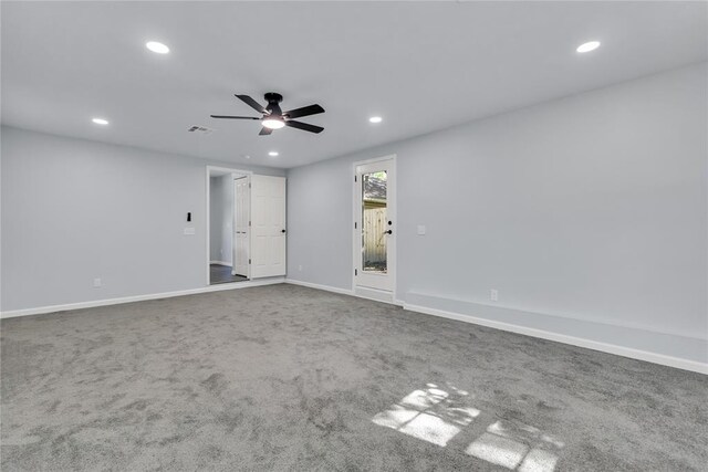 carpeted empty room featuring recessed lighting, a ceiling fan, and baseboards
