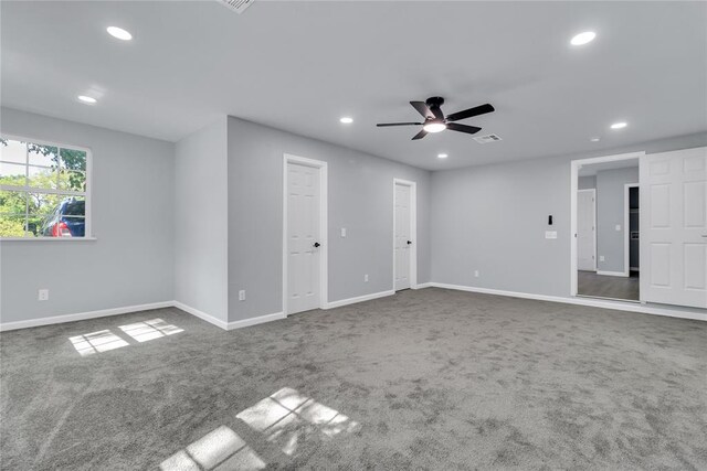 unfurnished living room with recessed lighting, carpet, baseboards, and ceiling fan
