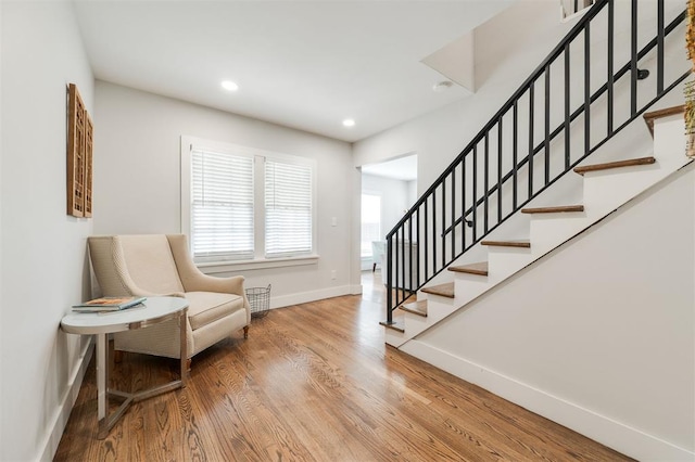 2237 NW 30th St, Oklahoma City, OK 73112 - sitting room featuring baseboards, stairs, wood finished floors, and recessed lighting