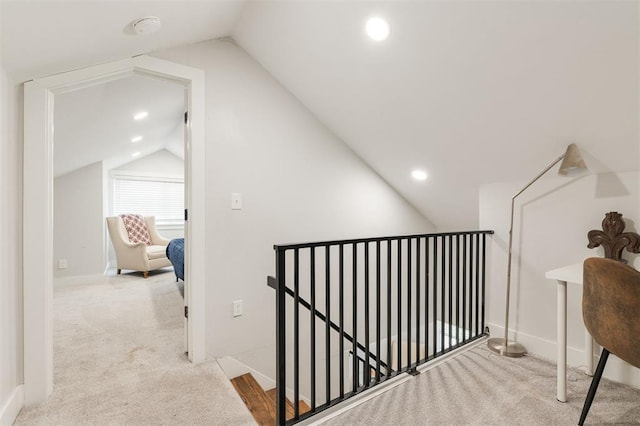 2237 NW 30th St, Oklahoma City, OK 73112 - hall with an upstairs landing, lofted ceiling, carpet flooring, and recessed lighting