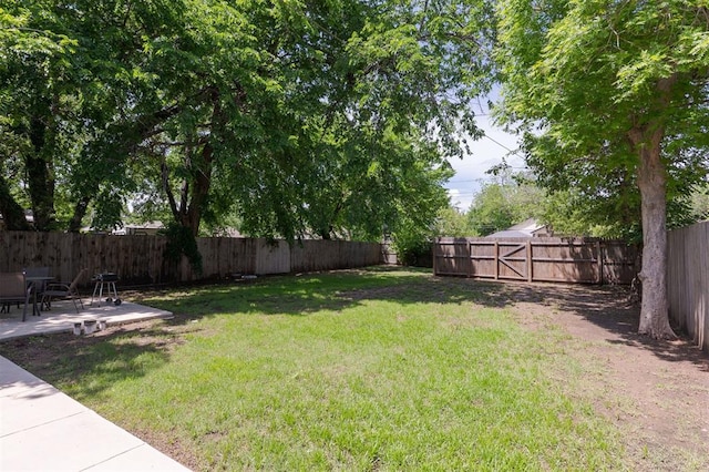 2237 NW 30th St, Oklahoma City, OK 73112 - view of yard with a patio