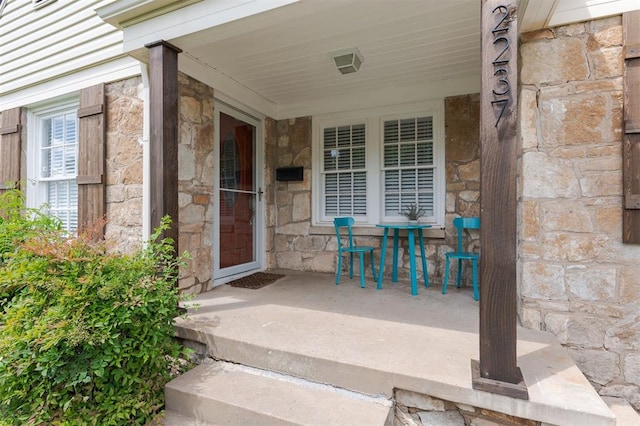 2237 NW 30th St, Oklahoma City, OK 73112 - entrance to property featuring stone siding and covered porch