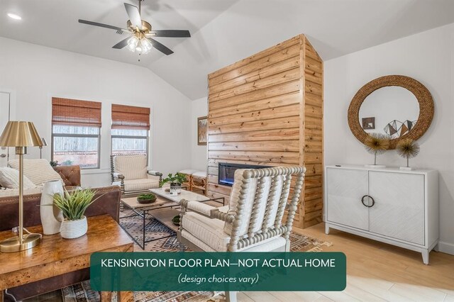 24119 Western Ave, Washington, OK 73093 - living room with a fireplace, lofted ceiling, ceiling fan, and wood finished floors