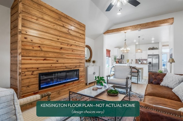 24119 Western Ave, Washington, OK 73093 - living area featuring vaulted ceiling, a glass covered fireplace, a ceiling fan, light wood-style floors, and recessed lighting