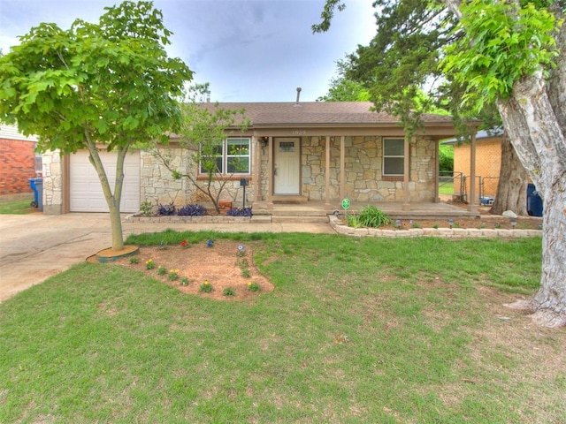 1829 Westchester Dr, Oklahoma City, OK 73120 - single story home featuring stone siding, driveway, covered porch, and a front lawn