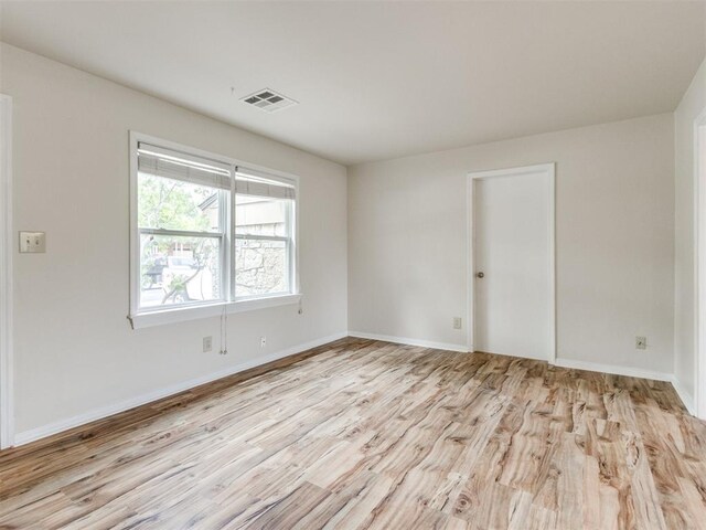 1829 Westchester Dr, Oklahoma City, OK 73120 - unfurnished room featuring wood finished floors and baseboards