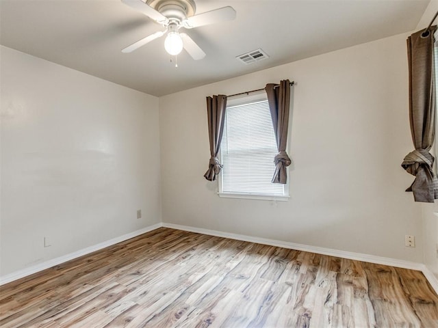 1829 Westchester Dr, Oklahoma City, OK 73120 - empty room with wood finished floors, baseboards, and a ceiling fan