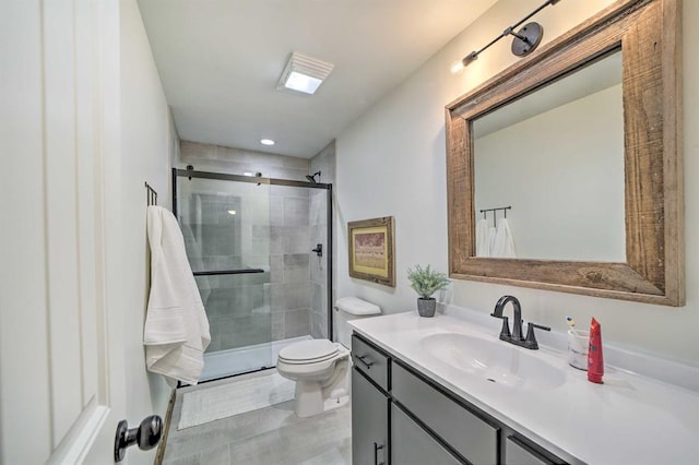 519 N J St, Eufaula, OK 74432 - bathroom featuring vanity, a shower stall, toilet, and recessed lighting