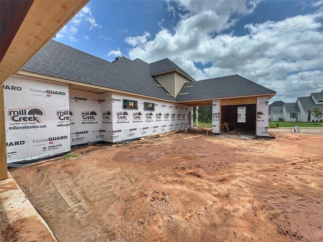 6201 Canopy Ln, Edmond, OK 73025 - view of property exterior featuring a shingled roof