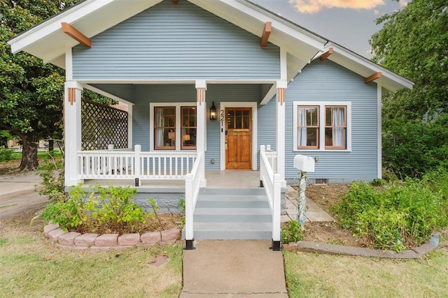 221 Alameda St, Norman, OK 73069 - bungalow-style home featuring a porch