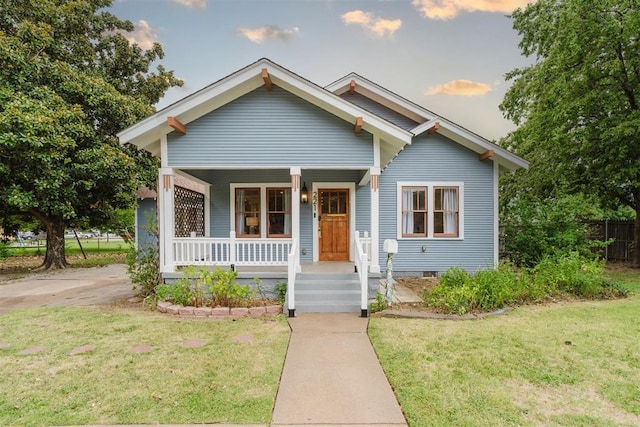 221 Alameda St, Norman, OK 73069 - bungalow-style house with covered porch
