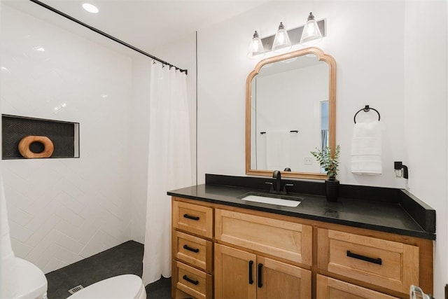 221 Alameda St, Norman, OK 73069 - full bath featuring toilet, vanity, and tiled shower