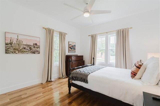 221 Alameda St, Norman, OK 73069 - bedroom featuring light wood finished floors, baseboards, and a ceiling fan