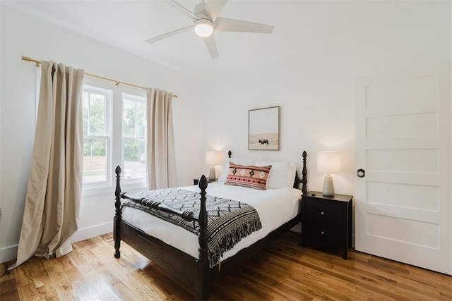 221 Alameda St, Norman, OK 73069 - bedroom with light wood-style flooring and a ceiling fan