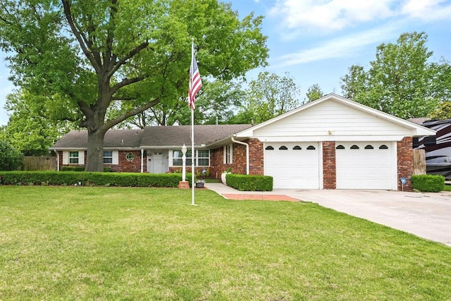 3222 Wilshire Ter, Oklahoma City, OK 73116 - single story home with an attached garage, concrete driveway, a front yard, and brick siding