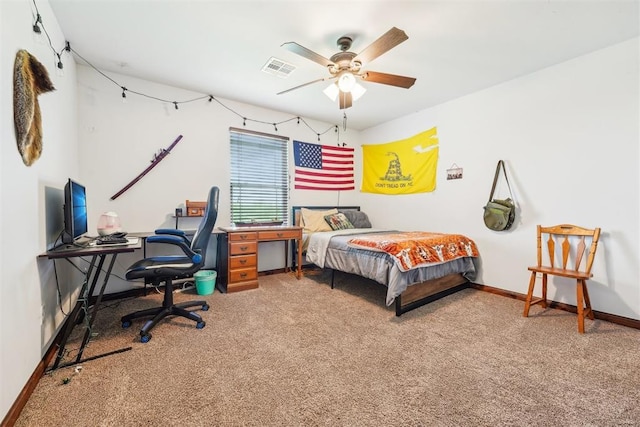 18421 State Highway 24, Purcell, OK 73080 - carpeted bedroom with baseboards, an office area, and a ceiling fan