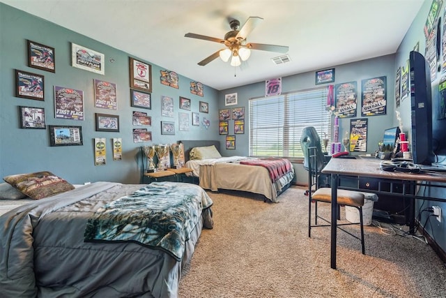 18421 State Highway 24, Purcell, OK 73080 - carpeted bedroom with an office area and a ceiling fan