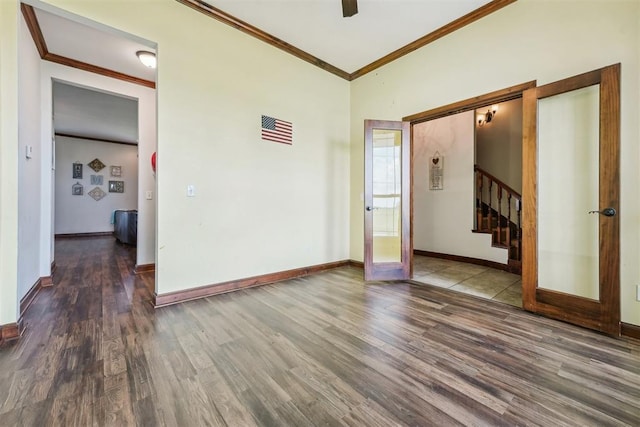 18421 State Highway 24, Purcell, OK 73080 - empty room with wood finished floors, crown molding, french doors, stairway, and baseboards
