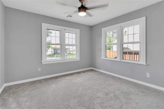 503 W Martin St, El Reno, OK 73036 - carpeted spare room with a ceiling fan and baseboards