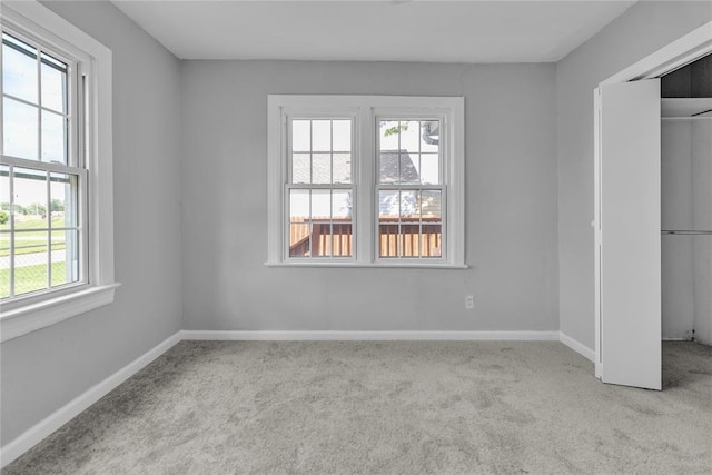 503 W Martin St, El Reno, OK 73036 - unfurnished bedroom featuring carpet floors, baseboards, and a closet