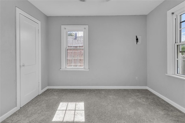 503 W Martin St, El Reno, OK 73036 - empty room featuring carpet floors and baseboards