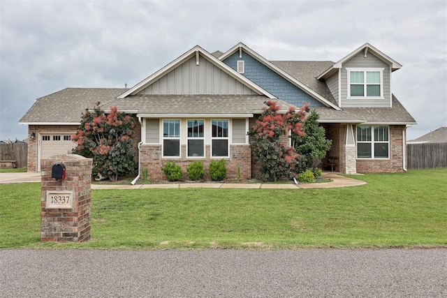 18337 Tombstone Trl, Norman, OK 73072 - craftsman-style house with an attached garage, board and batten siding, roof with shingles, and brick siding