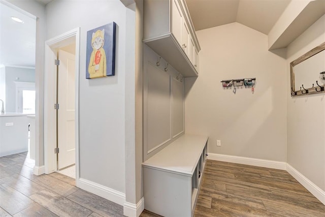 18337 Tombstone Trl, Norman, OK 73072 - mudroom featuring wood finished floors and baseboards