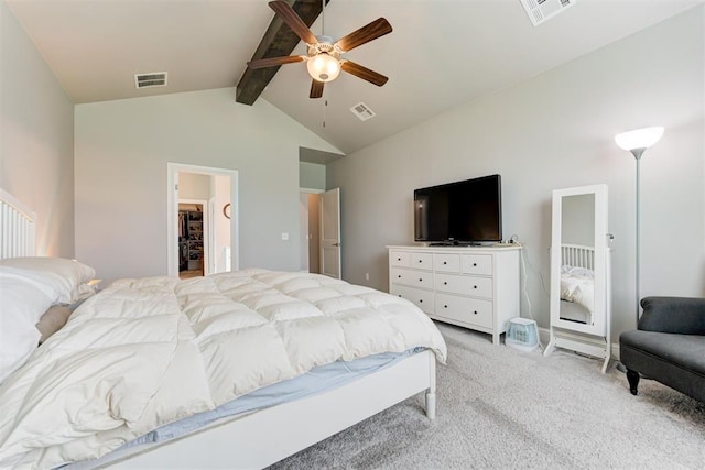 18337 Tombstone Trl, Norman, OK 73072 - bedroom with light colored carpet, a walk in closet, and ceiling fan