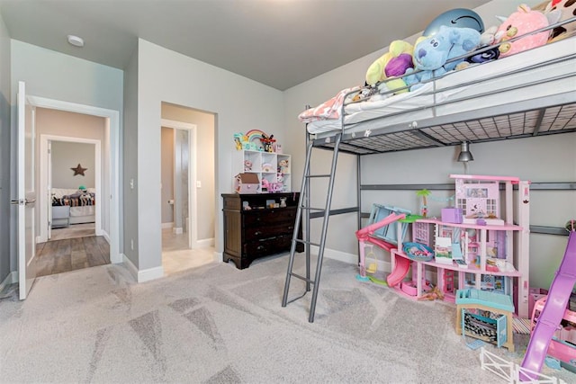 18337 Tombstone Trl, Norman, OK 73072 - bedroom featuring baseboards and carpet