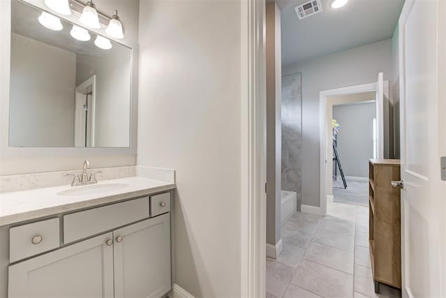 18337 Tombstone Trl, Norman, OK 73072 - bathroom featuring vanity, baseboards, and tile patterned floors